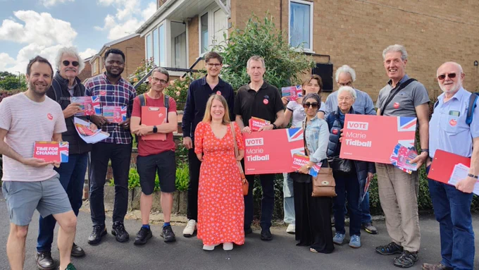 A photo of Labour Party campaigners. Marie Tidball is standing at the front.