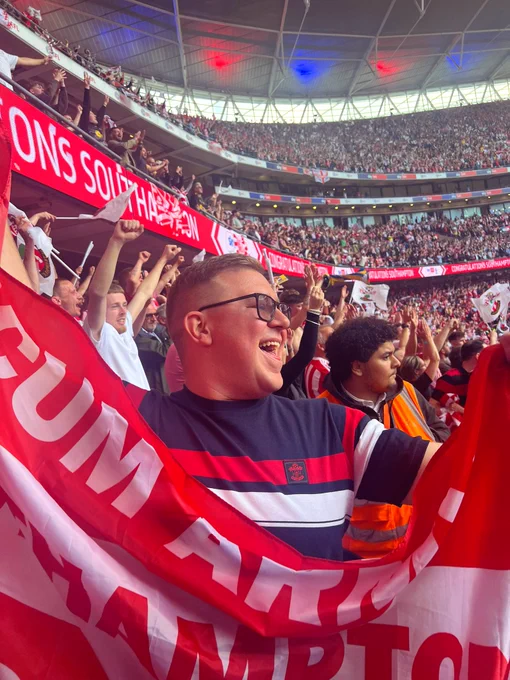 Josh very excitingly flying his flag in Wembley as Saints win the final