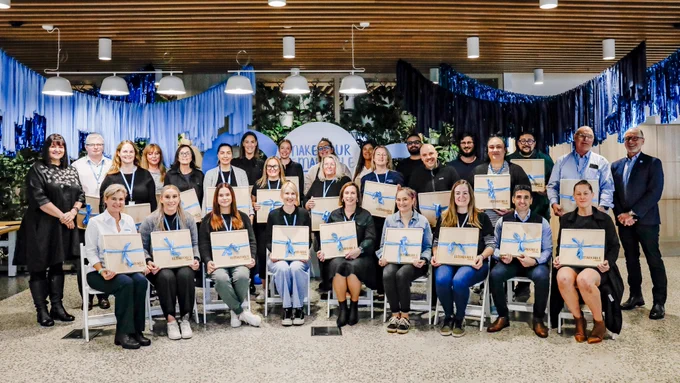 GMHBA staff pose with their long service gifts. 