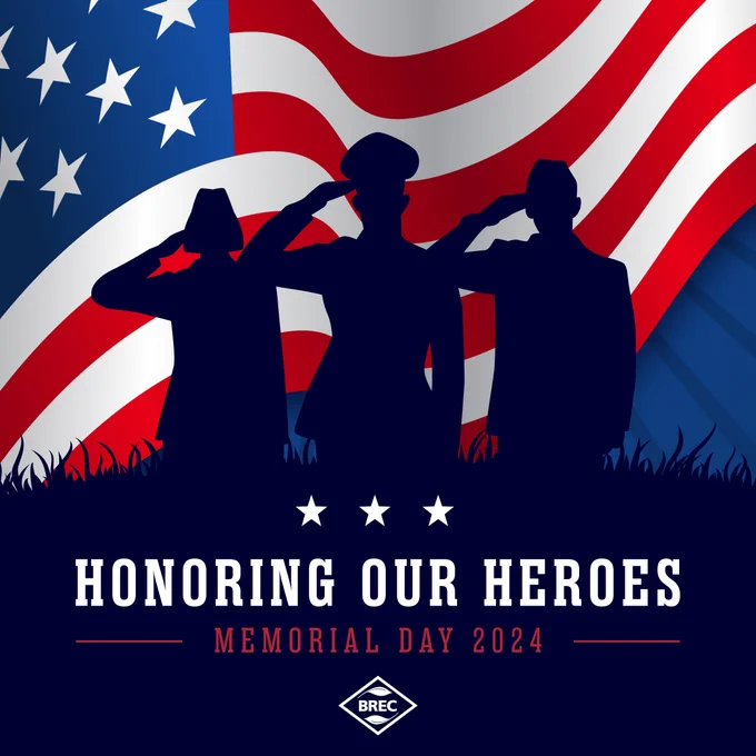 Graphic illustration for Memorial Day 2024 featuring three silhouetted figures saluting against a backdrop of the American flag with flowing red and white stripes and stars. Bold text at the bottom reads "HONORING OUR HEROES, MEMORIAL DAY 2024." The logo "BREC" is also visible.