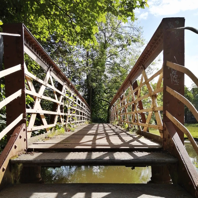 The footbridge over to Engineering, with dappled light and shade creating a geometric effect