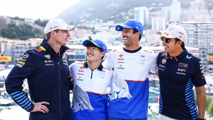 Max Verstappen, Yuki Tsunoda, Daniel Ricciardo and Checo Perez stood together laughing at the Monaco GP.