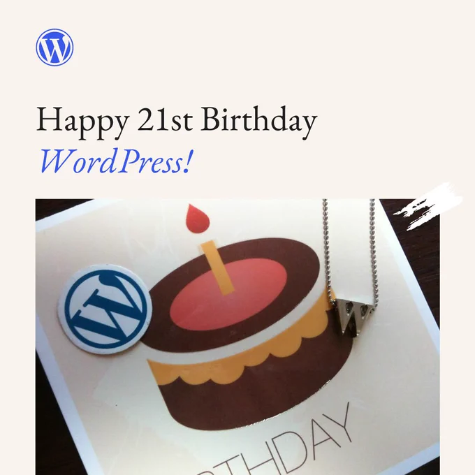 A birthday card with the text "Happy 21st Birthday WordPress!" featuring an illustration of a cake with a candle on top. Next to the card is a necklace with a pendant shaped like the WordPress logo.