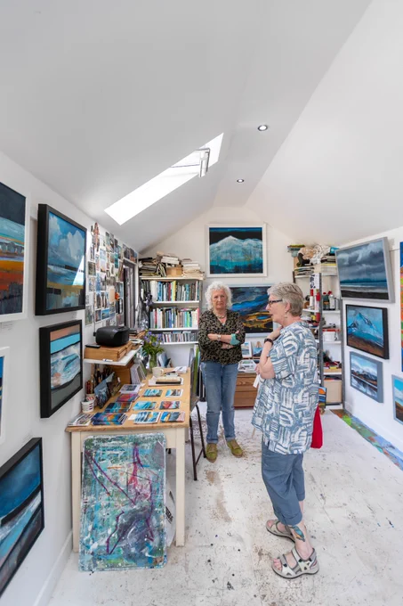 Two women in an artist's studio