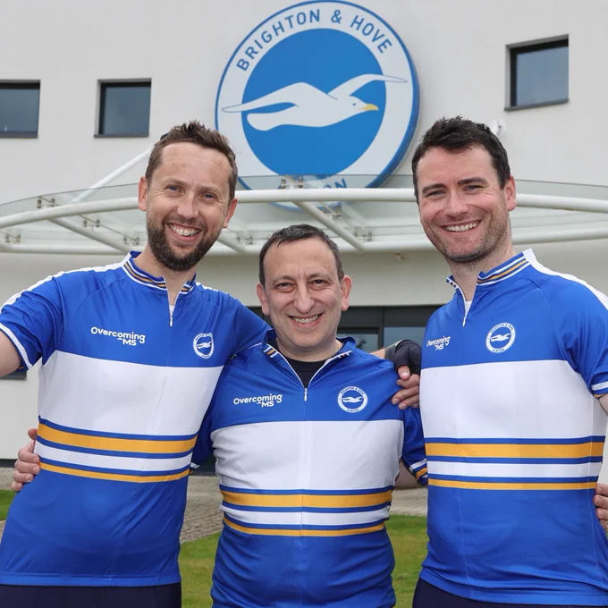 Jonny, Tony Bloom and Stuart posing for a pic together outside our training ground. 