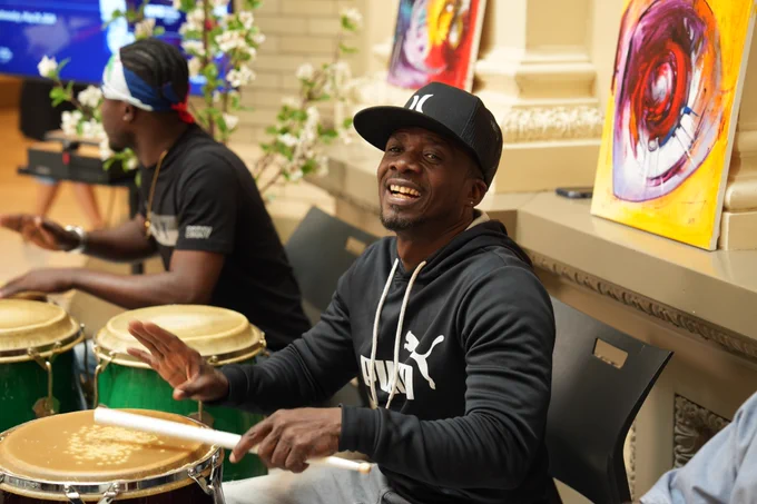 Music performer at a Haitian Heritage Month event at Tweed.
