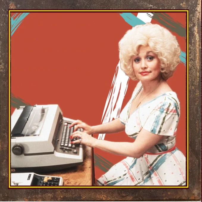 Dolly Parton sitting at a typewriter 