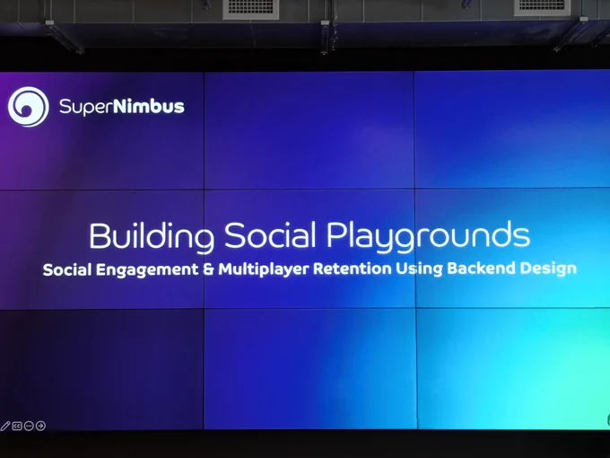 The starting slide of the SuperNimbus Workshop, titled "Building Social Playgrounds - Social Engagement & Multiplayer Retention Using Backend Design."