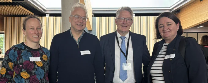 2 men and 2 women photographed at an event