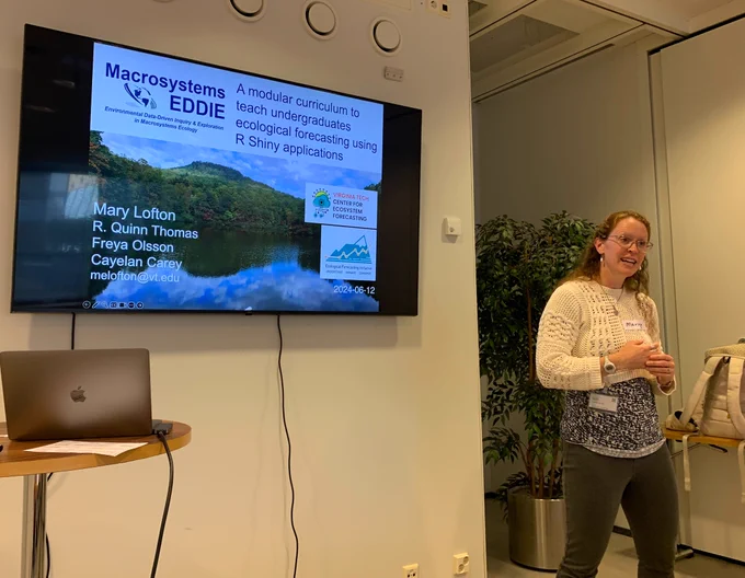 Dr. Mary Lofton giving an introductory presentation on Macrosystems EDDIE modules for #EFI2024 attendees