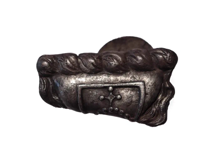 The rear of the silver pilgrim badge