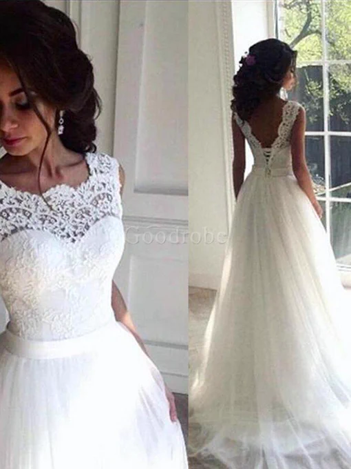Robe de mariée textile en tulle ceinture en étoffe cordon manche nulle énergique goodrobe.fr
