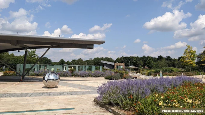 The entrance to the Wellcome Genome Campus, on a bright sunny day.