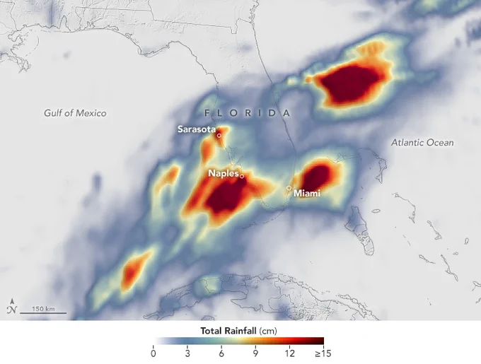 Map of total rainfall data, in centimeters, over southern Florida on June 11, 2024. Dark red colors show the highest rainfall, over 15 centimeters. Light blue shows rainfall rates between 0-3 centimeters. There are dark red splotches over Naples and Sarasota on Florida’s west coasts, as well as Miami on the east coast and out over the Atlantic Ocean.