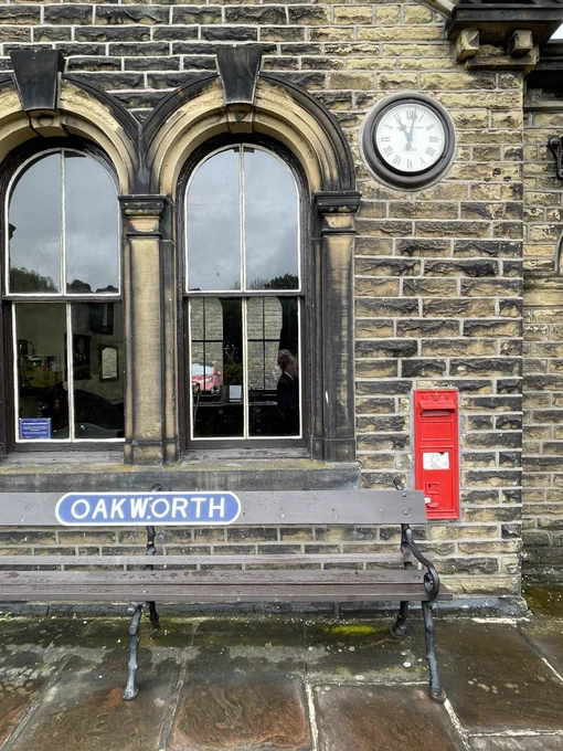 Oakworth Station platform with postbox