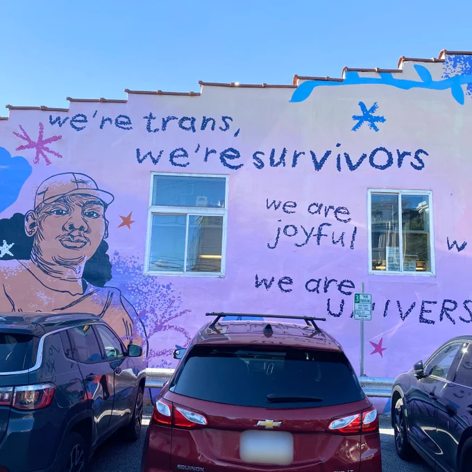 A picture of the mural “We Are Universal” by artist Kah Yangni.