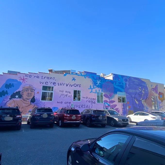 A picture of the mural “We Are Universal” by artist Kah Yangni.