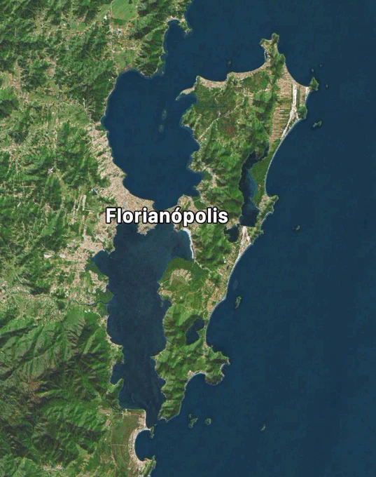 florianópolis in brazil, half on a long and narrow island and half on a peninsula that reaches form the mainland to almost touch the island