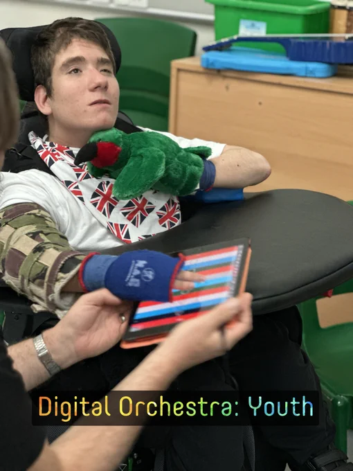 Boy plays Figurenotes on Thumbjam on iPad