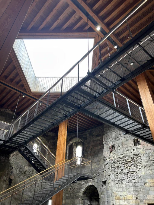 Inside Clifford’s Tower. The walls are stone but the interesting thing is looking up at the new wooden ceiling with a hole in the middle and the metal staircases and walkways.