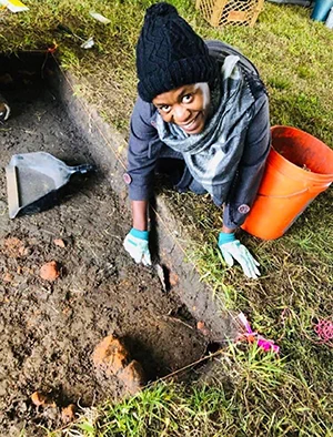 Katongo outside digging
