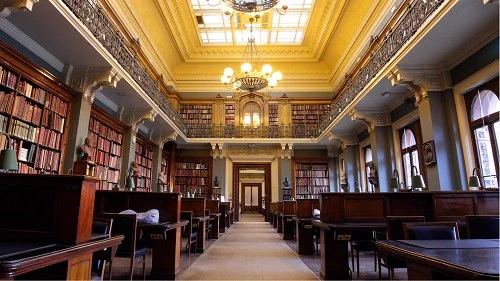 Victoria and Albert Museum Library study area and shelves on two levels