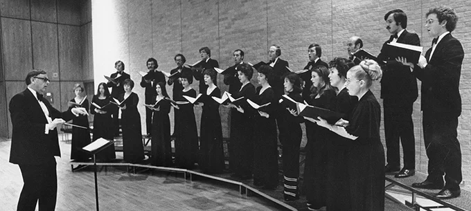 Gordan Lamb (the first director of the UTSA Division of Music) conducts the UTSA Chamber Chorale during the 1976-1977 school year.