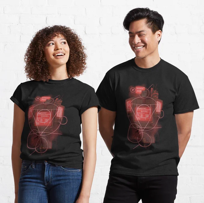 A mock-up of two people wearing black t-shirts. On the t-shirt is a design in red featuring old-fashioned computers, keyboards, and alchemic symbols.