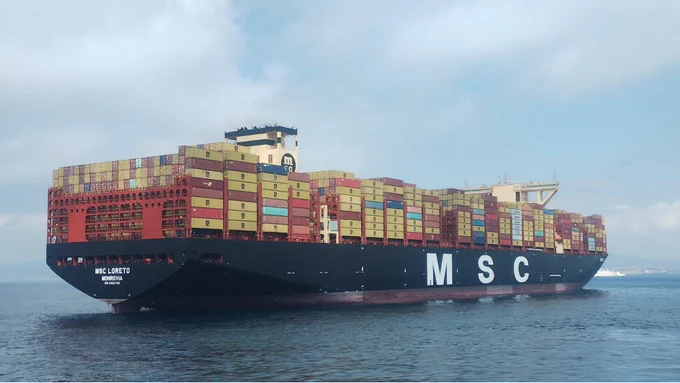 A "post-Panamax" container ship, so named because it's too large to fit in the Panama Canal. 
Image source: Wikipedia, licensed under CC BY-SA 4.0.