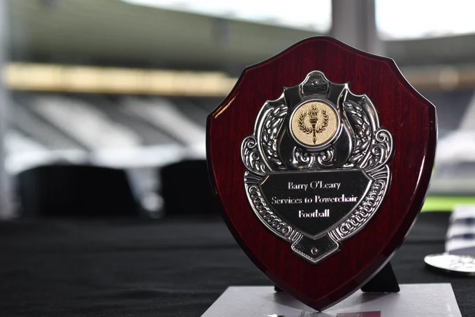 The Barry O'Leary Services to Powerchair Football commemorative shield that is awarded to the winner. 