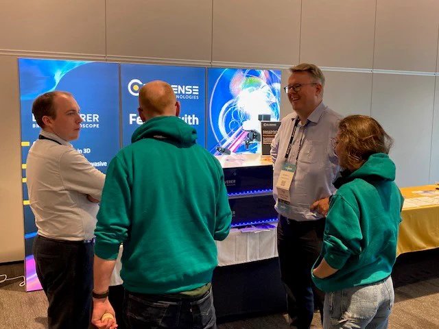 Exhibitors chat with visitors at elmi2024