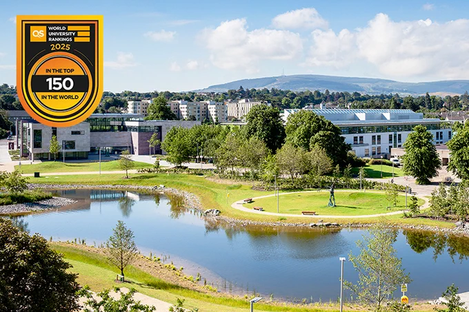 Photo of the upper lake on the UCD Belfield Campus with a QS World University Rankings 2024 - Top 150 In the World graphic   