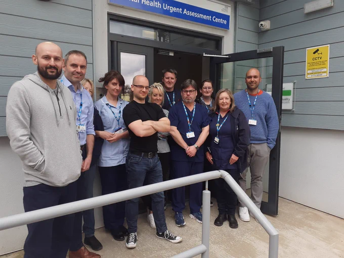 Photo of Blackpool Mental Health Liaison Team standing outside their building