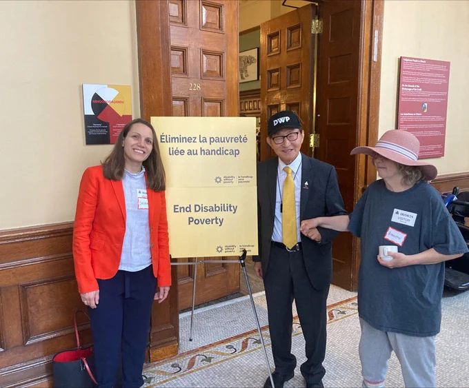 TNGCS Director of Community Programs Serena Nudel (left) greets other participants at the Disability Without Poverty's "Better the Benefit" campaign kickoff