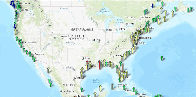 A map of the US, depicting arrows showing increased or decreased sea level along the coastline, with colors corresponding to amount increase/decrease