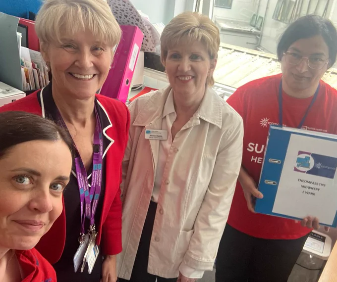 Chief Executive and Deputy Chief Executive pictured with staff in Ward E in maternity services.