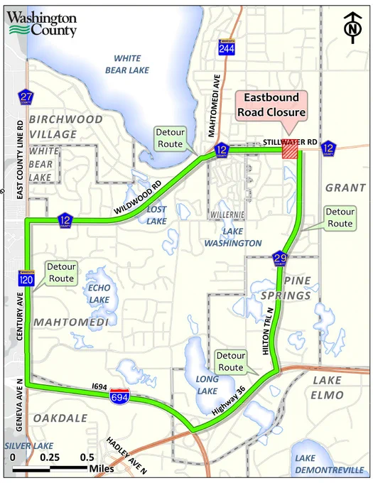Detailed map of Washington County showing a detour route in green for an eastbound road closure. Major roads and towns are labeled, and there's a mileage scale in the lower left corner.