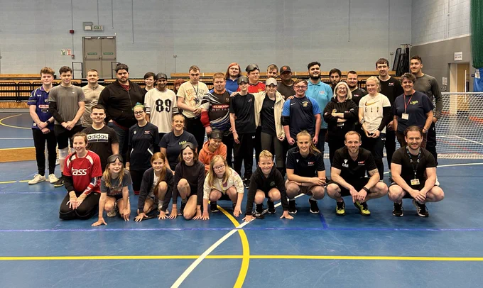 Group photo of all participants who were involved in today’s Goalball event. There are approximately 35 people stood in a group across 3 rows. With everyone in the front row kneeling down.