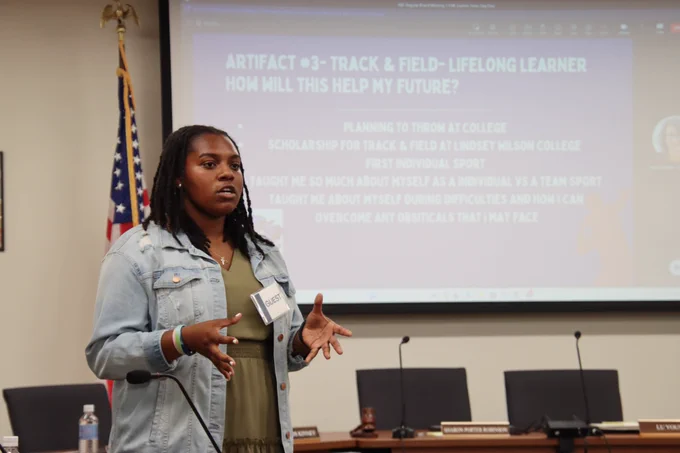 A student presenting their defenses of learning 