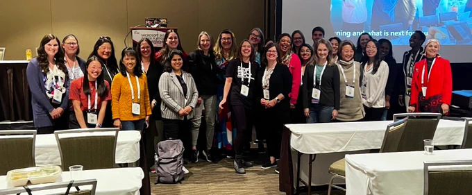 Co-presenters, Karuana Gatimu and Heather Cook, taking a photo with all attendees who joined in the lunchtime discussion - during TechCon365 - Seattle 2024.