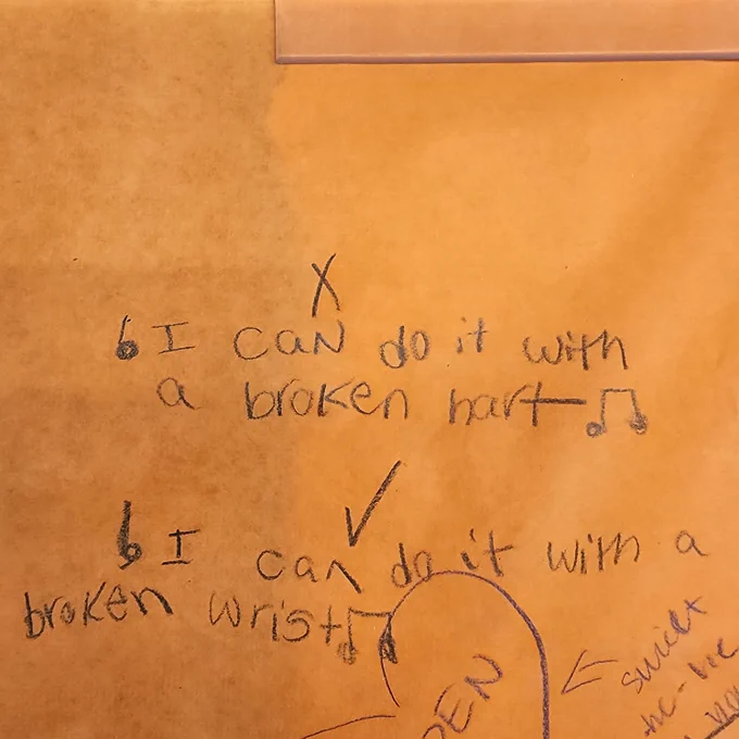 Taylor Swift lyrics, "I can do it with a broken heart" followed by a rewrite that says "I can do it with a broken wrist."