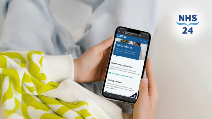 Photo of someone using the NHS inform website on a mobile phone