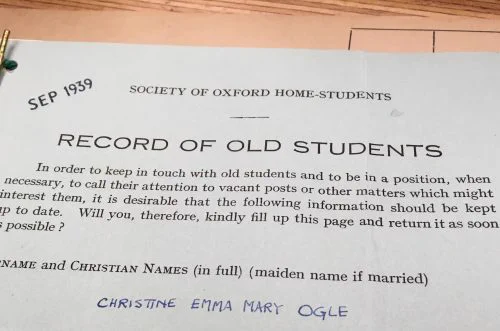 The top of a form titled "Record of Old Students" with Christine Emma Mary Ogle listed as the Surname and Christian Names.
