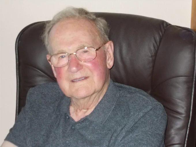 Head and shoulders shot of Charlie Horne in his home
