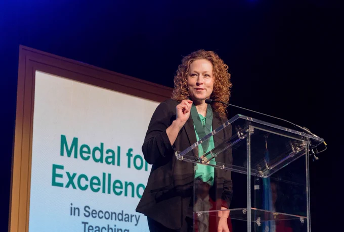 Claremore educator Jill Andrews speaks at the Academic Awards Celebration.