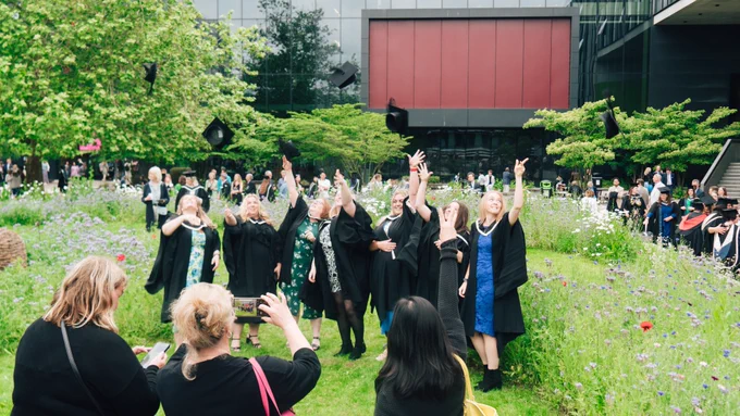 Recent graduates and guests.