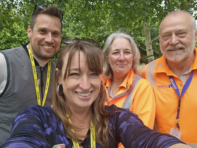 Selfie of Lee, Emily & instructors smiling