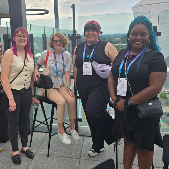ASM Young Ambassadors posing for a picture on a rooftop at ASM Microbe