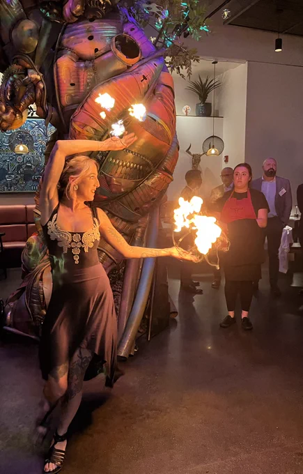 DLA Piper client reception during the INTA Annual Conference at AltaToro in Atlanta: Fire dancer doing performance. 