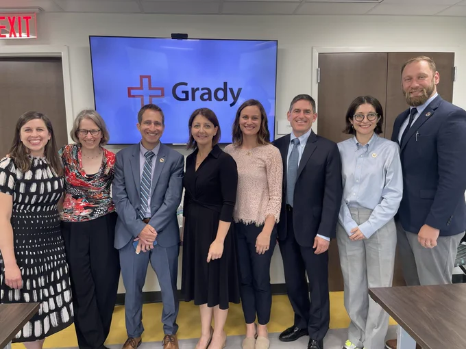 Dr. Cohen poses with Grady Health Center leadership.